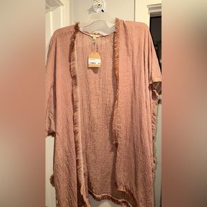 Cover up size M runs bigger